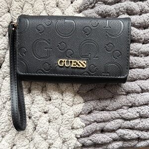 GUESS Embossed Black Wristlet with Gold Logo